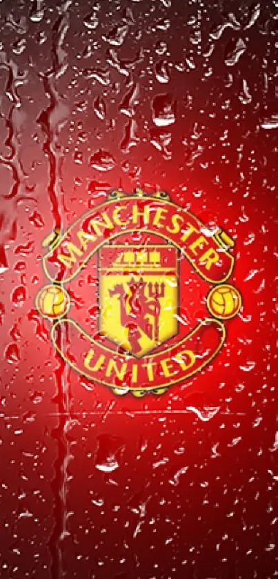 Manchester United logo on a red background with water droplets.