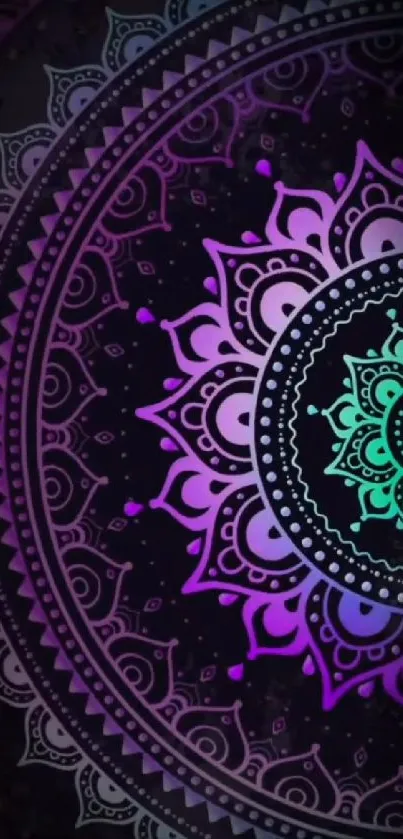 Vibrant purple and teal mandala design on a dark background.