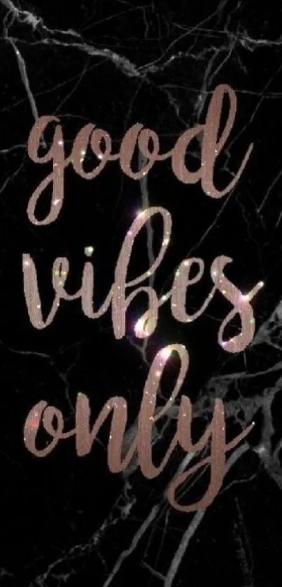 Marble wallpaper with 'Good Vibes Only' text in shimmering letters.