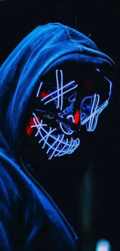 Neon mask with glowing lines in dark hood.