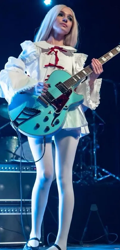 Electric guitarist performing on stage with blue guitar in stylish outfit.