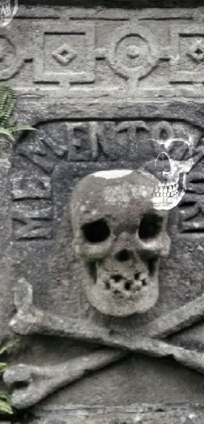 Memento mori skull stone engraving with crossbones.