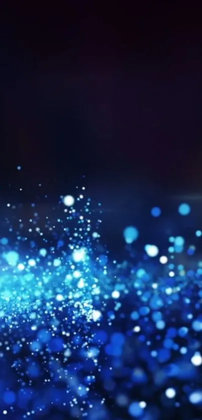 Mesmerizing blue bokeh wallpaper with glowing light dots.