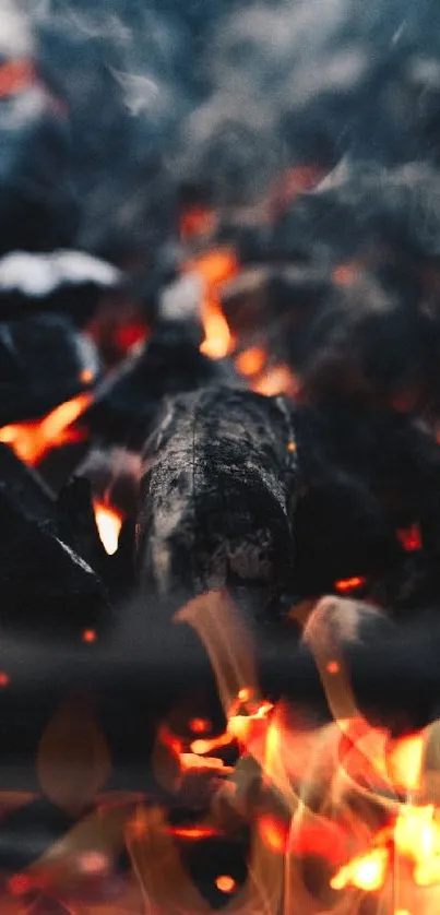 Burning embers with glowing coals and dark hues for mobile wallpaper.