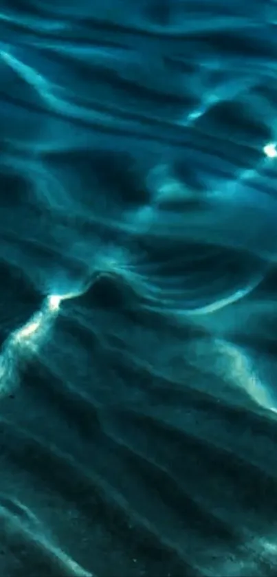 Dark blue ocean waves with textured patterns.