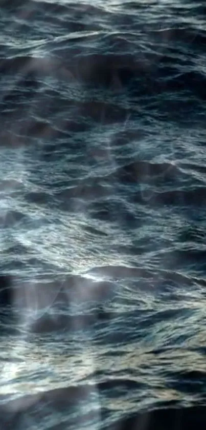 Dark blue ocean waves with swirling motion, creating a soothing visual.