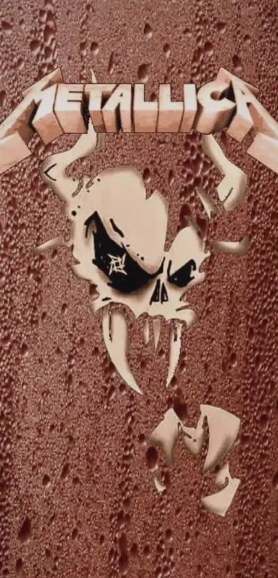 Edgy skull art wallpaper with metallic band logo in copper tones.