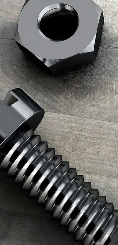 Metallic bolt and nut on a textured wooden surface.