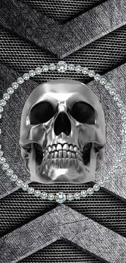 Metallic skull with diamond halo on textured background.