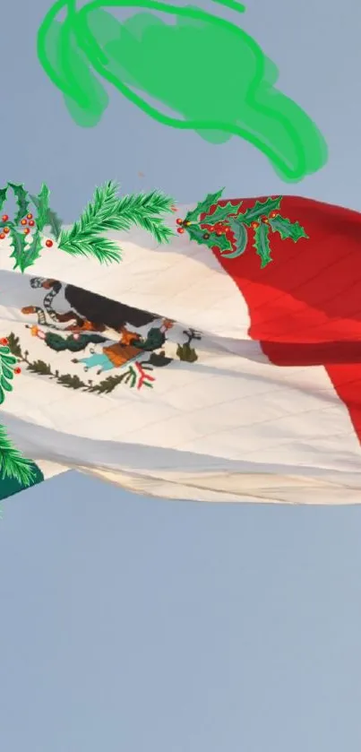 Mexican flag with green leaves on a clear blue sky background.