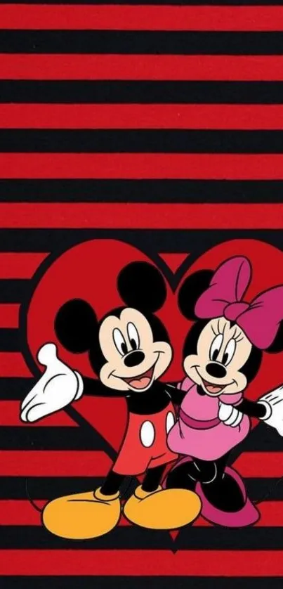 Mickey and Minnie Mouse on striped red and black wallpaper.