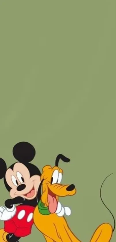 Mickey Mouse and Pluto on a green background wallpaper.