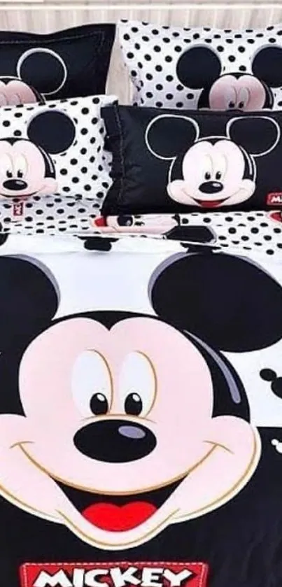 Mickey Mouse themed bedding with black and white polka dot design.