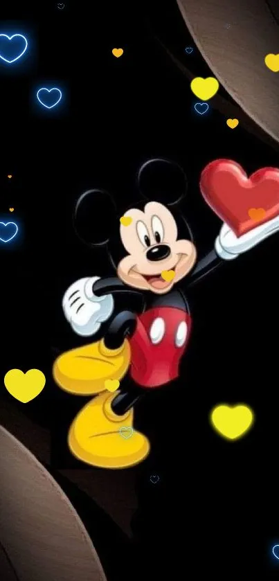 Mickey Mouse with a red heart on black background.