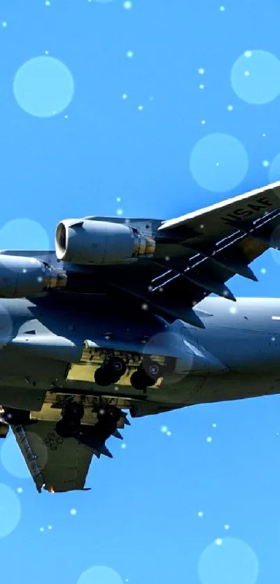 Military jet flying against a bright blue sky.