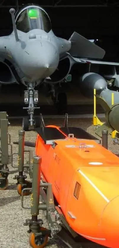 Military jet with various armaments on display.