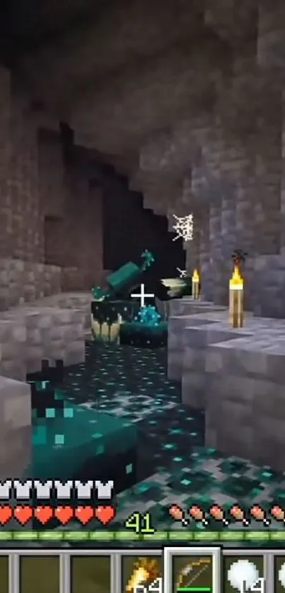 Minecraft cave scene with torches and dark atmosphere.