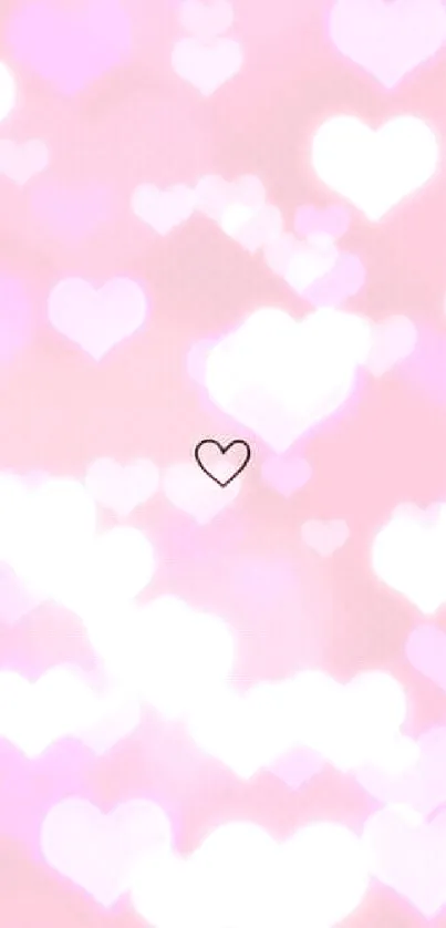 Minimal pink wallpaper with a small heart design.