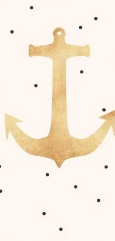 Golden anchor with black polka dots on white background.