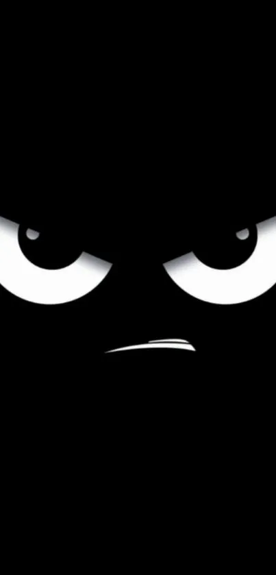 Minimalist angry face on black background wallpaper.