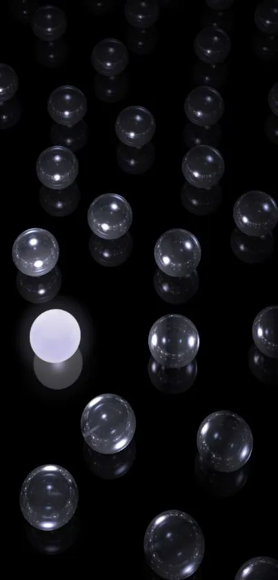 Minimalist mobile wallpaper with glowing spheres on a black background.