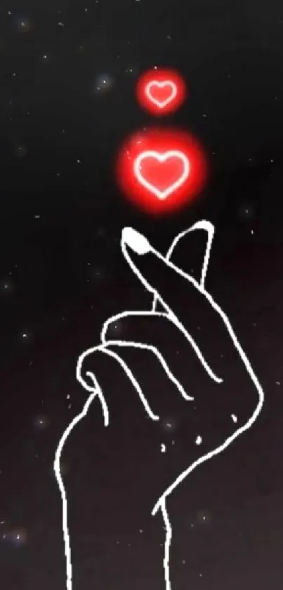 Hand gesture with red glowing hearts on black background.