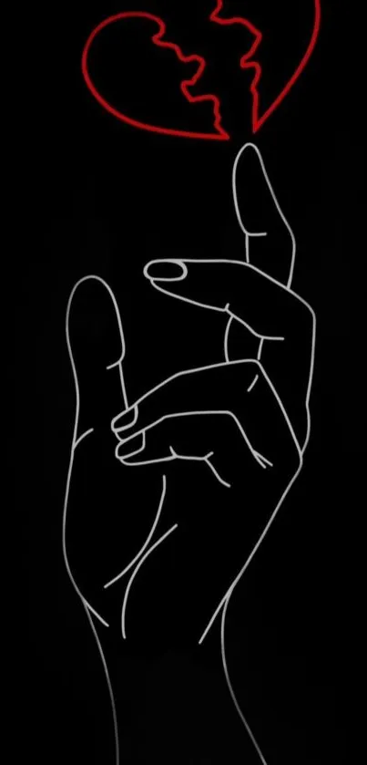 Hand outline with red broken heart on black background.