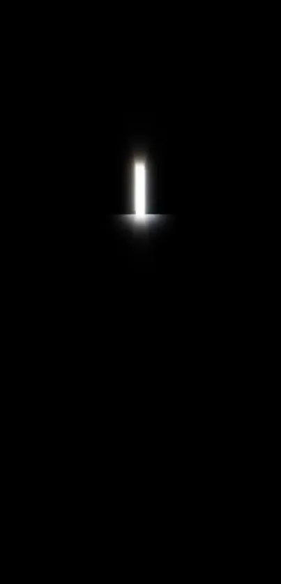 Minimalist dark wallpaper with glowing light portal.