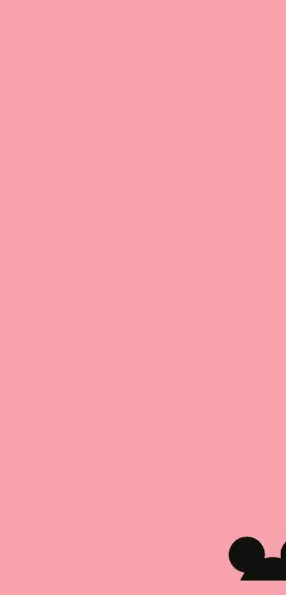 Minimalist pink wallpaper with black mouse silhouette.