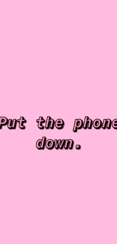 Minimalist pink wallpaper with 'Put the phone down' text.