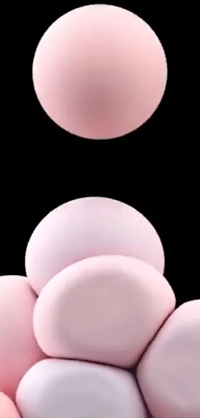 Minimalist design with pink spheres on black background.