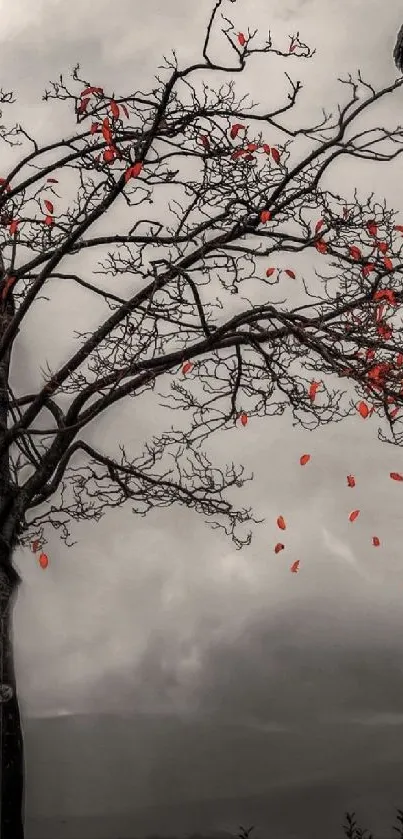 Monochrome artwork of a tree with red leaves and perched crow.