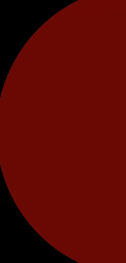 Minimalist red circle wallpaper with black background.