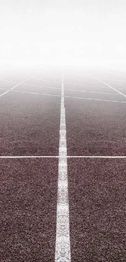 Minimalist foggy running track wallpaper