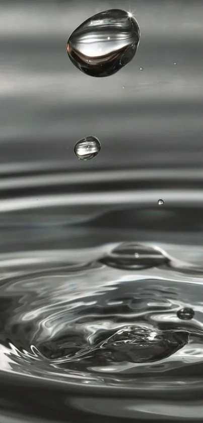 Close-up of water droplets rippling on a smooth, minimalist surface.