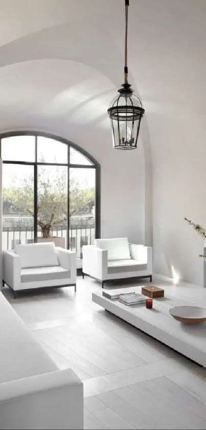 Minimalist white living room with modern furniture and natural light.