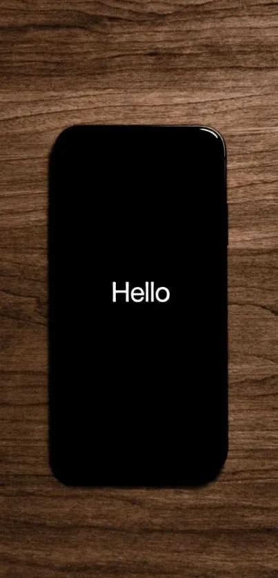 Minimalist phone wallpaper with wooden background and black phone.