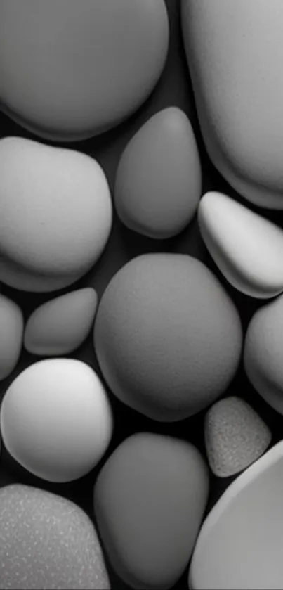 Minimalistic pebble art wallpaper with gray stones.