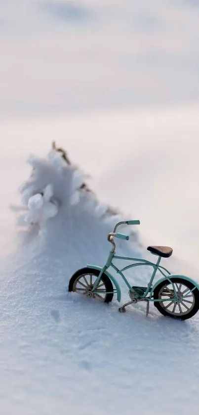 Mint bicycle resting on pristine snow.