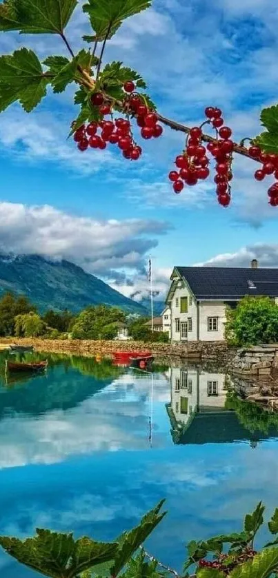Scenic mirror lake with mountains and red berries under a blue sky.
