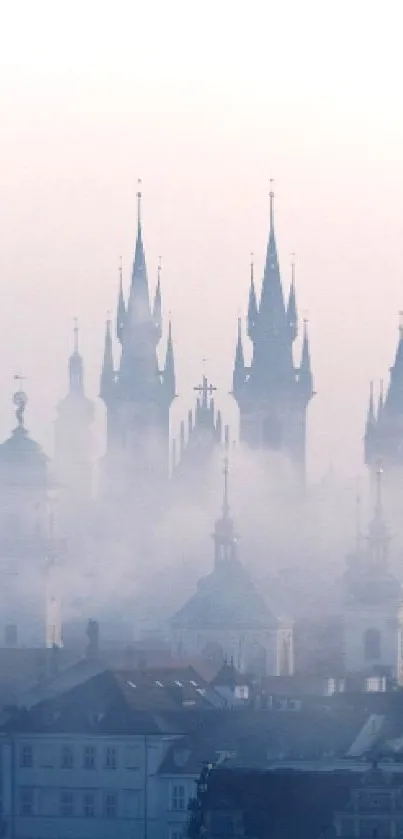 Misty cityscape with gothic towers emerging through the fog.