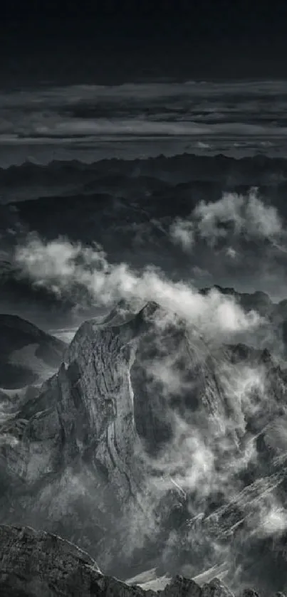 Misty mountain ranges under a dramatic sky.