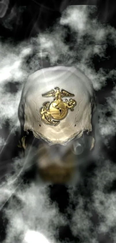 Skull design with marine emblem in swirling mist on dark background.