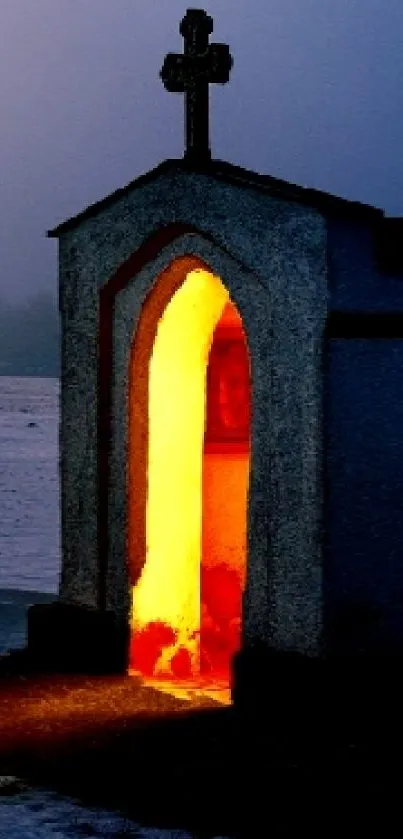 Misty snow-covered landscape with glowing chapel.