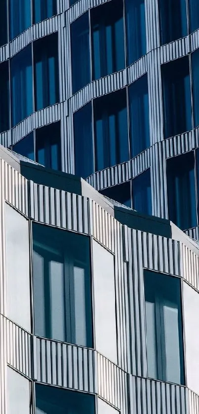 Modern geometric building facade with blue and white patterns.