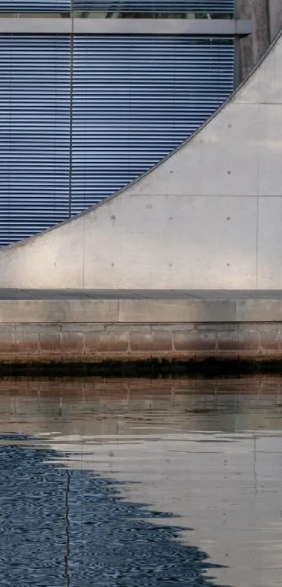Concrete structure reflected in water.