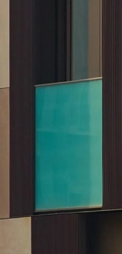 Modern architecture featuring teal window glass.