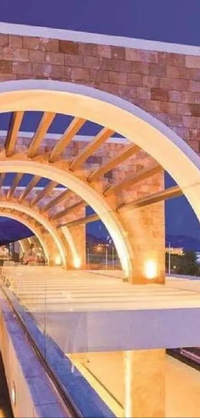 Modern archway with warm evening lighting and serene backdrop.