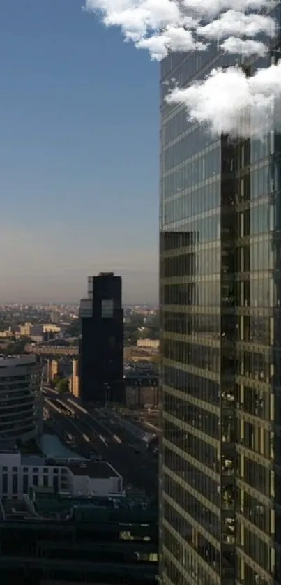 Reflection of modern skyscrapers with blue sky and clouds.