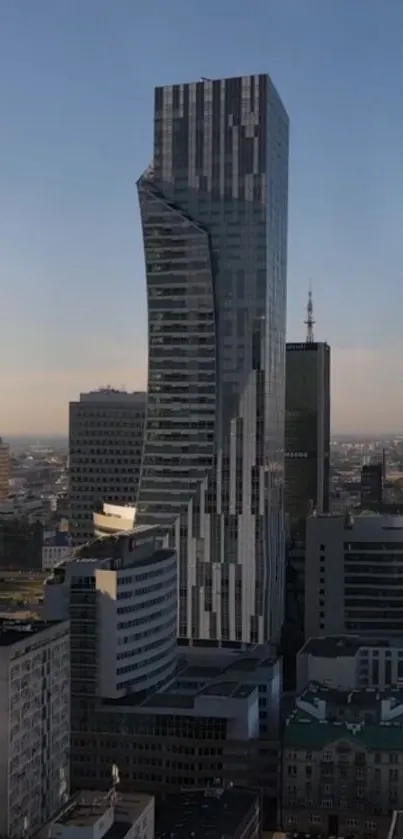 Modern skyscraper under a blue sky in cityscape view.